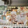 Pastel and rose gold baby shower balloon decoration with welcome board and teddy theme backdrop in Bhopal
