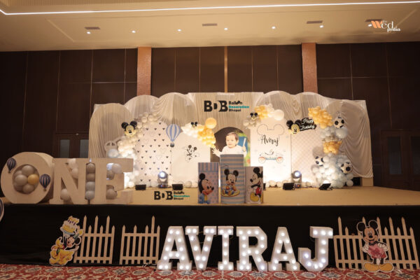 Kids birthday stage decoration with balloon arch in Bhopa