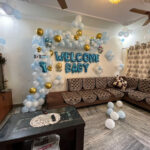 Welcome baby balloon decoration at home in Bhopal with blue and white balloons for newborn baby boy