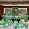 Jungle theme first birthday balloon decoration with name and safari animal balloons in Bhopal