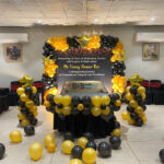 Luxury rose gold romantic couple bedroom decoration with balloons fairy lights and rose petals in Bhopal