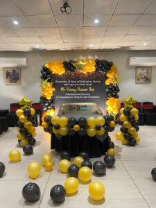 Luxury rose gold romantic couple bedroom decoration with balloons fairy lights and rose petals in Bhopal