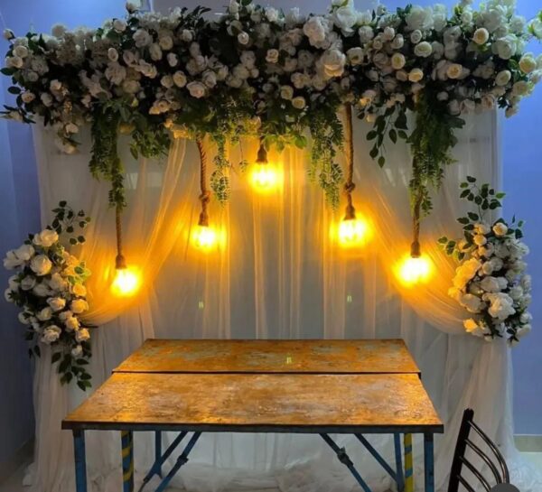 Floral Stage Decoration Setup with Hanging Lights | Elegant Event Backdrop Decoration